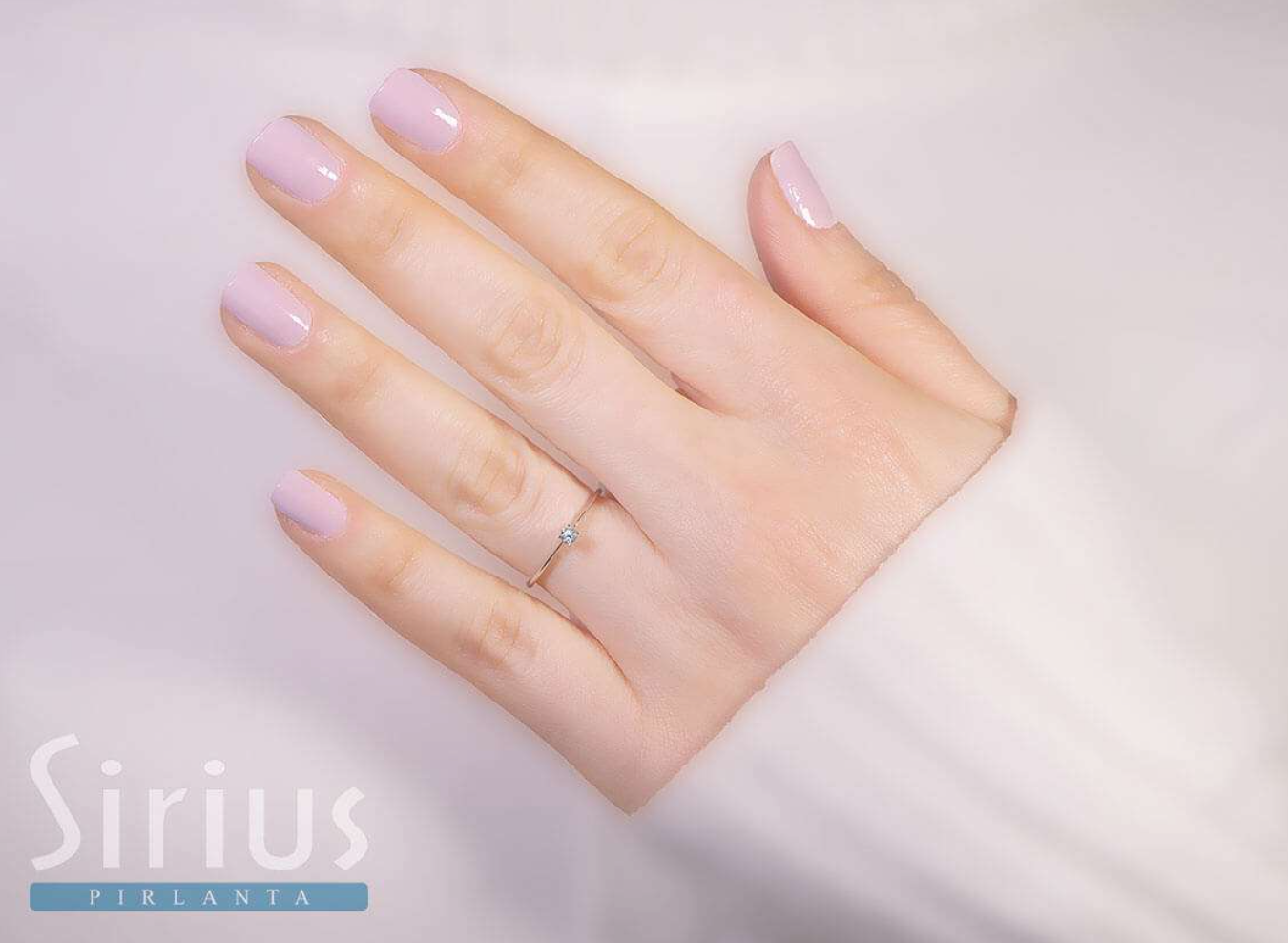 Bague solitaire diamant 0,06 carat