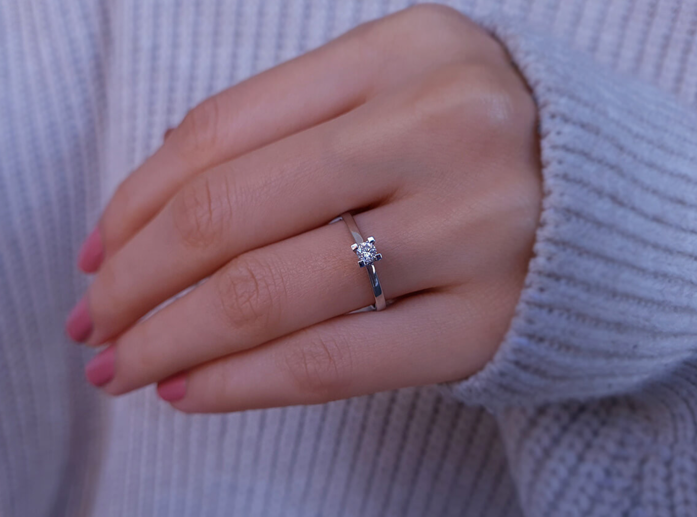 0.15 carat solitaire diamond ring