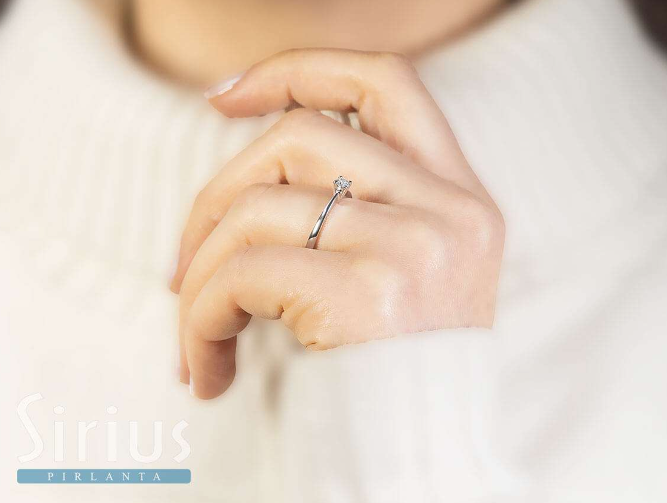 0.15 carat solitaire diamond ring