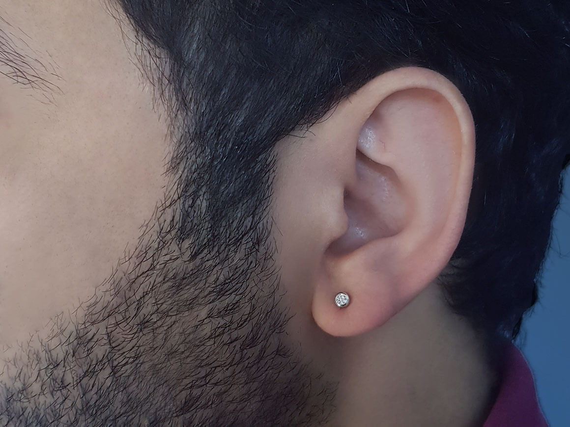 Boucles d'oreilles à tige avec diamant solitaire de 0,04 carat pour hommes