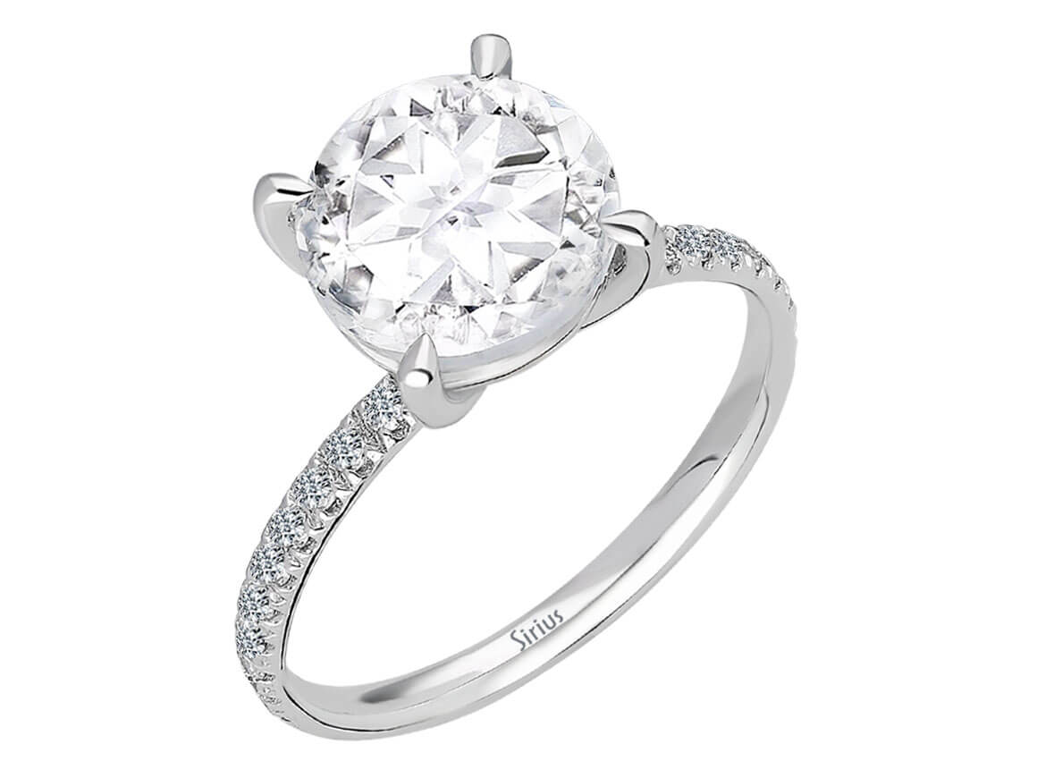 Bague diamant et topaze blanche
