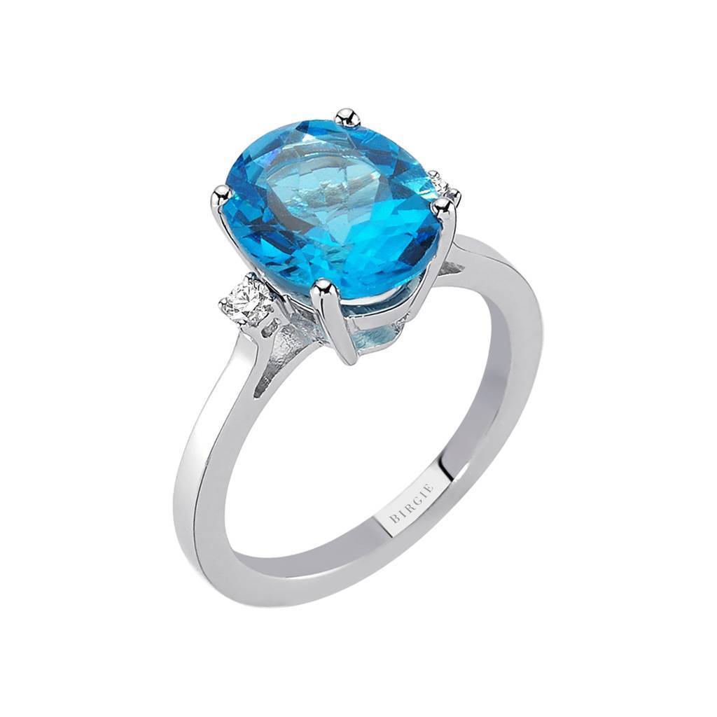 Bague diamant et topaze bleue ovale