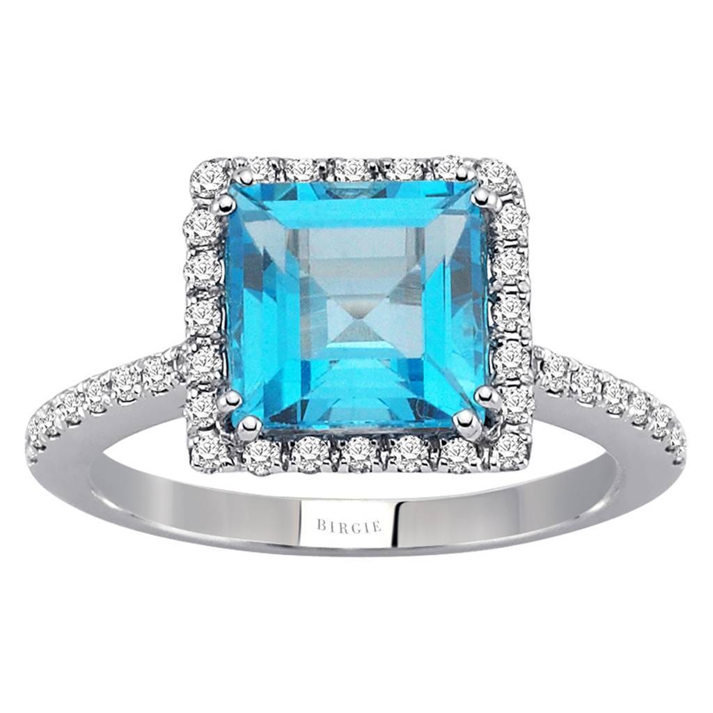 Bague diamant et topaze bleue princesse