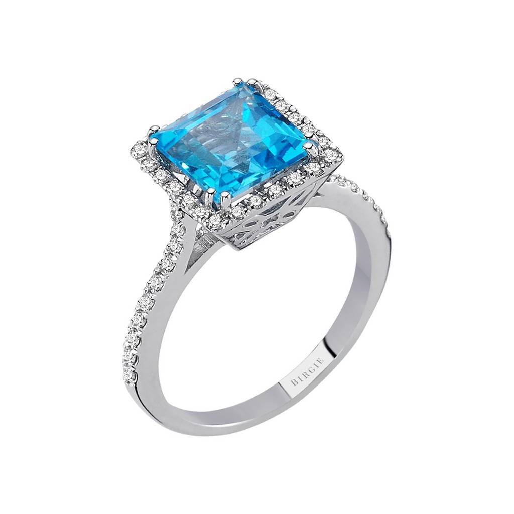 Bague diamant et topaze bleue princesse