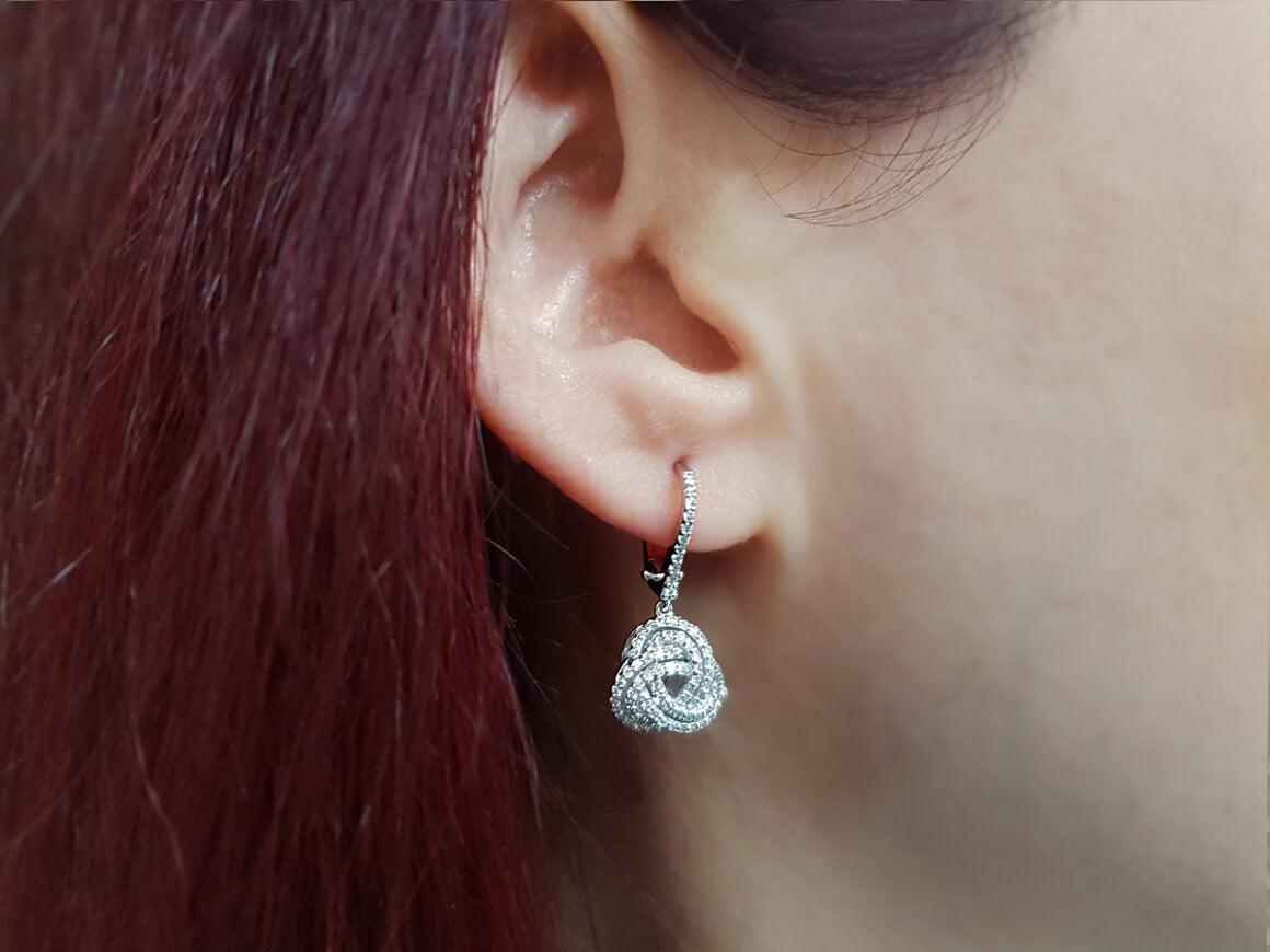 Boucles d'oreilles spirale éternelle en diamant