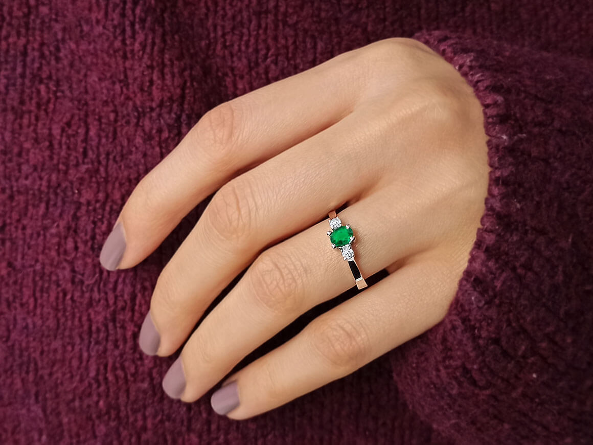 Diamond and Oval Emerald Ring