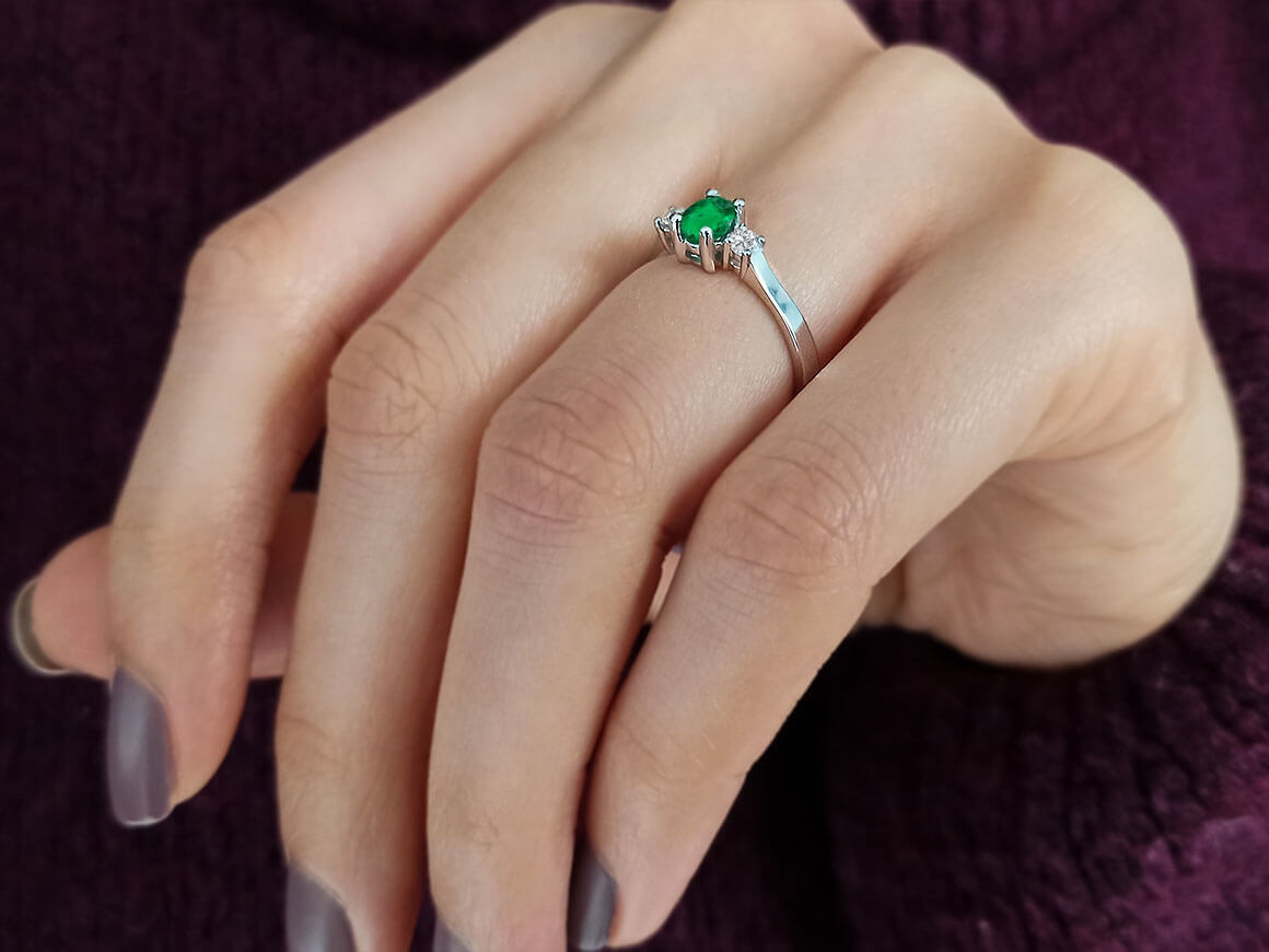 Diamond and Oval Emerald Ring