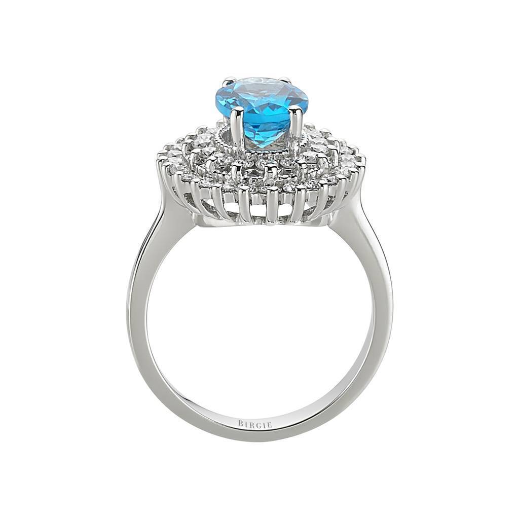 Diamond and Oval Blue Topaz Ring