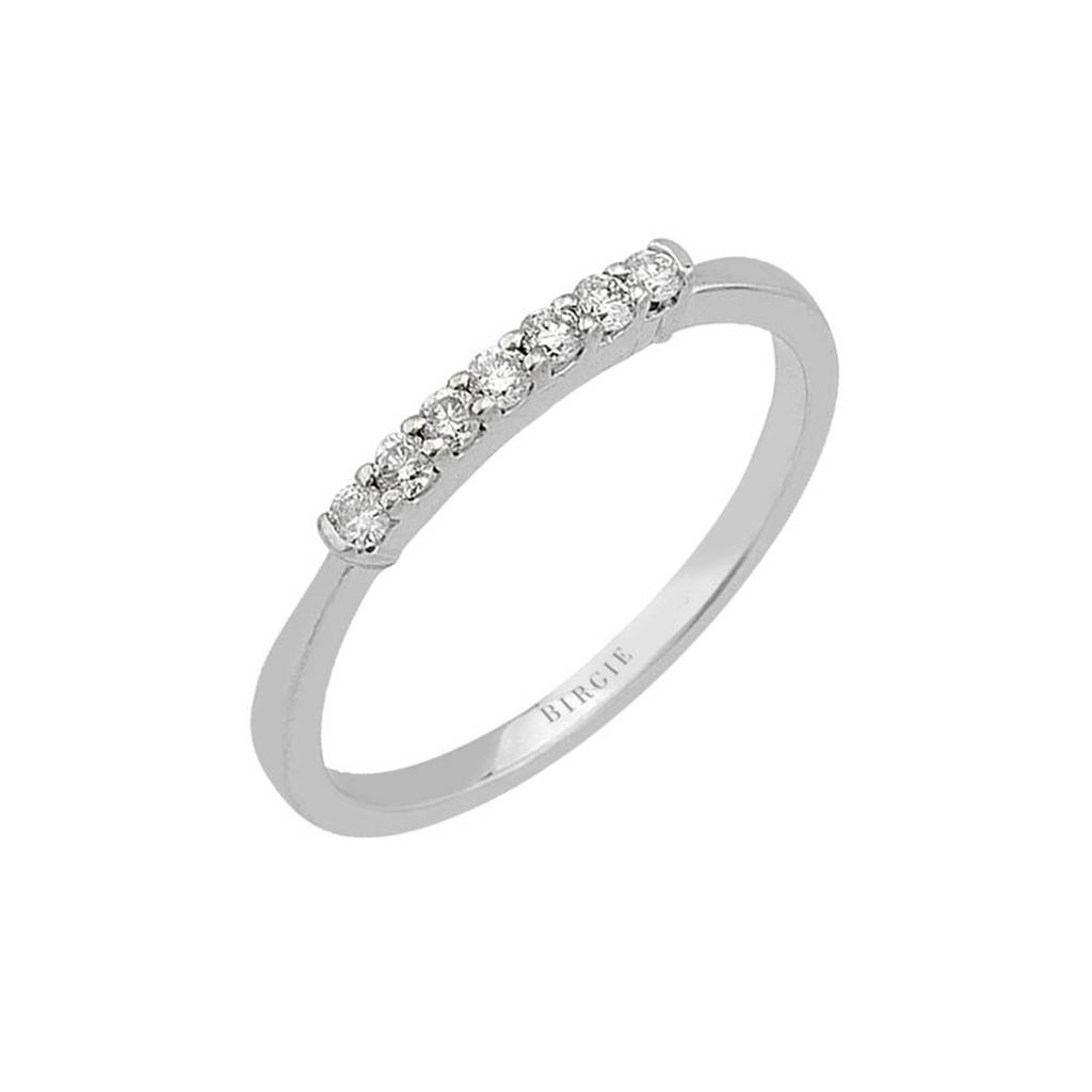 0.16 carat engagement ring with seven diamonds