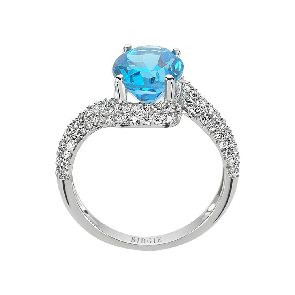 Bague diamant et topaze bleue ovale