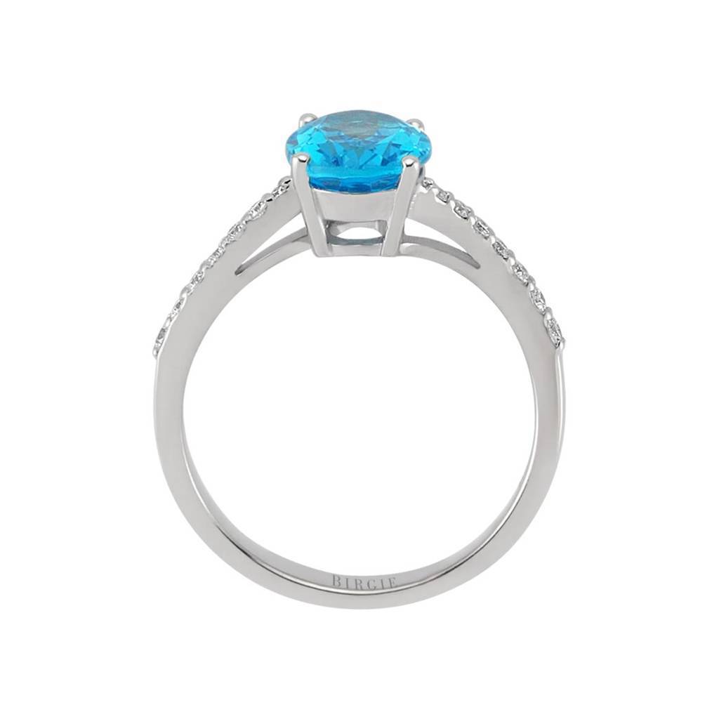 Bague diamant et topaze bleue taille ovale