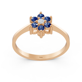 Elegant rose gold ring with sapphires and diamonds