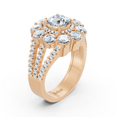 Bague halo en or rose avec diamants, émeraudes et rubis