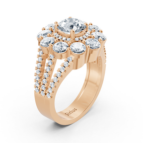 Bague halo en or rose avec diamants, émeraudes et rubis