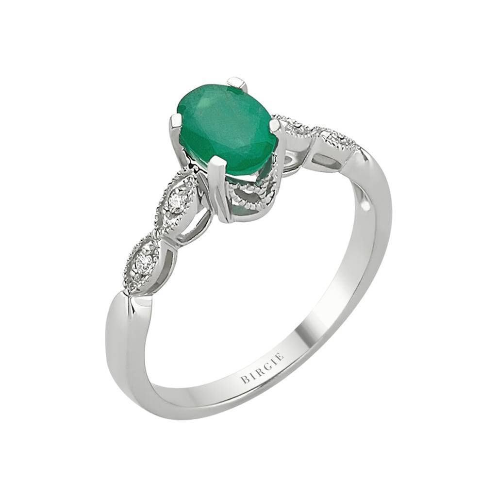 Oval Emerald and Single Prong Set Diamond Side Stones Ring