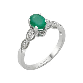 Oval Emerald and Single Prong Set Diamond Side Stones Ring