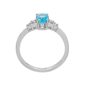 Diamond and Oval Blue Topaz Stone Ring