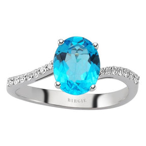 Diamond and Oval Cut Blue Topaz Ring